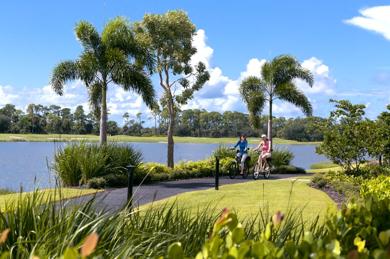 MPGL-Two Ladies Riding Bikes by Grande Lake (1)-1-2-1-1-1