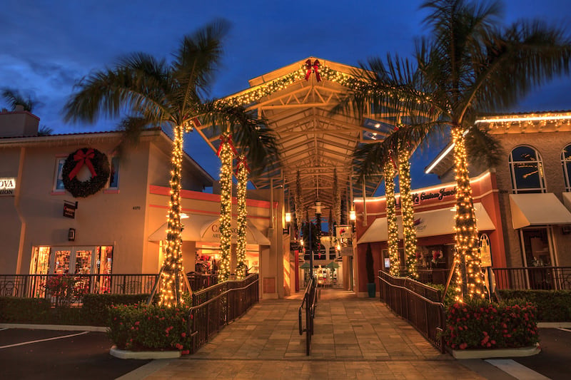 bigstock-Christmas-Lights-Glow-At-Sunse-267538816