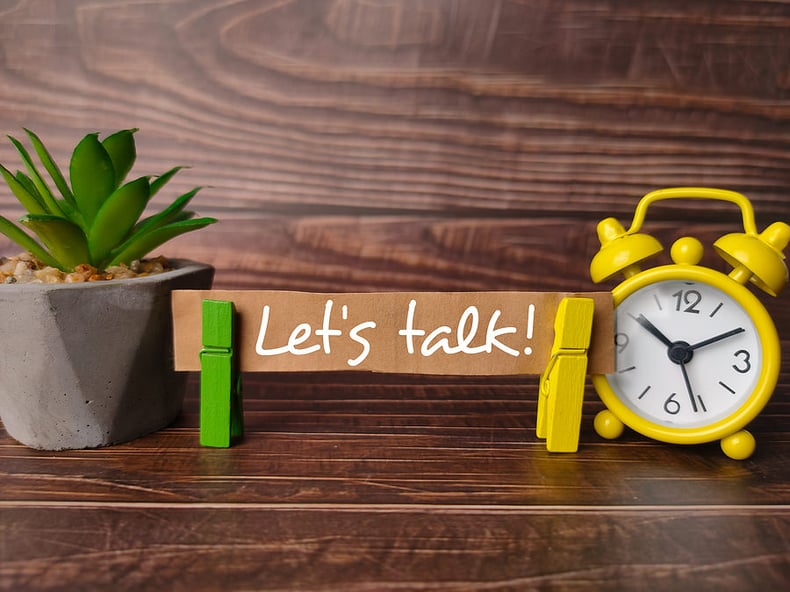 bigstock-Green-Plant-And-Alarm-Clock-Wi-440460686