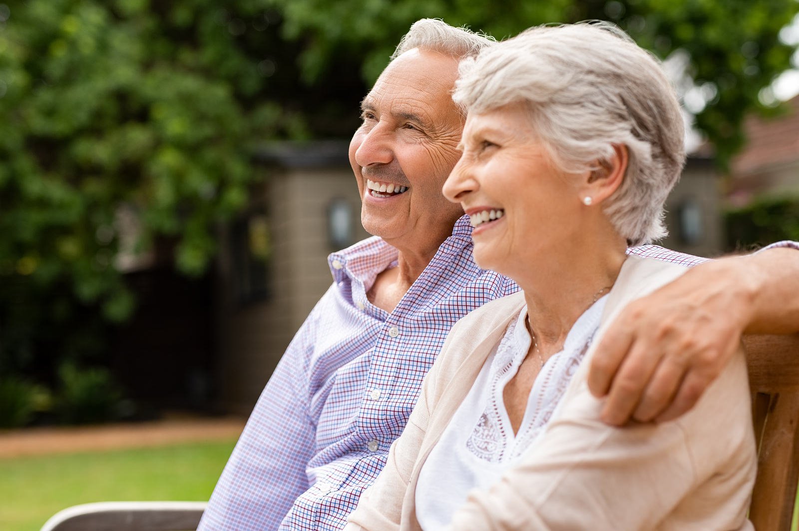 bigstock-Senior-couple-sitting-together-278553874