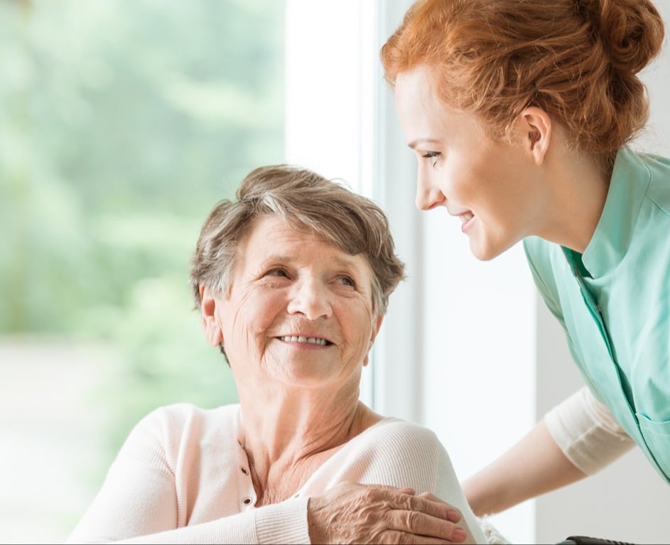 bigstock-Young-Nurse-Helping-An-Elderly-248055403 (1)